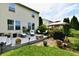 Backyard patio featuring outdoor seating and a grill, perfect for entertaining at 938 Weeping Way Ln, Avon, IN 46123