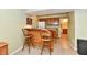 Basement wet bar with a refrigerator, cabinets and sink at 938 Weeping Way Ln, Avon, IN 46123