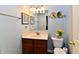Cozy bathroom featuring a marble countertop, decorative plates, and neutral color scheme at 938 Weeping Way Ln, Avon, IN 46123