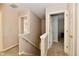 Upstairs hallway has carpet floors and is freshly painted at 938 Weeping Way Ln, Avon, IN 46123