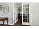 Elegant office entrance with glass french doors offers abundant natural light and privacy at 938 Weeping Way Ln, Avon, IN 46123