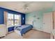 This bedroom features light blue walls, carpet, window, and a twin bed at 951 Gondola Run, Greenfield, IN 46140