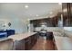 Spacious kitchen boasts stainless steel appliances, a center island, and ample counter space at 951 Gondola Run, Greenfield, IN 46140