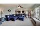 Open concept living area with ample seating, great natural light and adjoins the dining and kitchen areas at 951 Gondola Run, Greenfield, IN 46140