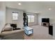 Upstairs loft area with neutral carpet, plenty of natural light, and space for recreation at 951 Gondola Run, Greenfield, IN 46140