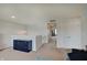 Upstairs loft area with neutral carpet, fresh paint, and plenty of room for recreation at 951 Gondola Run, Greenfield, IN 46140
