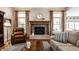Comfortable living room with a fireplace, hardwood floors, and a neutral color scheme at 1020 Lair Ct, Westfield, IN 46074