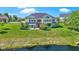 Aerial view of the spacious backyard, deck, and paver patio at 1020 Lair Ct, Westfield, IN 46074