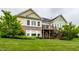 Spacious backyard featuring a deck and paver patio at 1020 Lair Ct, Westfield, IN 46074