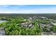 Breathtaking aerial view of a town featuring lush greenery and a distant city skyline at 1064 Reserve Way, Indianapolis, IN 46220