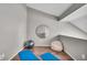 This bonus room with hardwood floors has a mirrored wall and space for yoga or relaxation at 1064 Reserve Way, Indianapolis, IN 46220