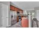 Spacious kitchen with stainless steel appliances, granite countertops, and tiled floor at 1064 Reserve Way, Indianapolis, IN 46220