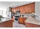 Well-equipped kitchen with stainless steel appliances and granite countertops at 1064 Reserve Way, Indianapolis, IN 46220