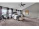 Spacious primary bedroom with vaulted ceilings, ample natural light, and neutral decor at 1064 Reserve Way, Indianapolis, IN 46220