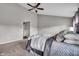 Comfortable primary bedroom featuring plush carpeting and a ceiling fan at 1064 Reserve Way, Indianapolis, IN 46220