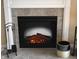 Elegant fireplace with a decorative white mantel and tiled surround, creating a warm and inviting focal point at 10731 Jimmy Lake Dr, Indianapolis, IN 46239