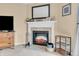 Cozy fireplace featuring decorative mantel and tile surround, creating a focal point in the living space at 10731 Jimmy Lake Dr, Indianapolis, IN 46239