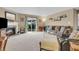 A living room with fireplace, plush carpet and a sliding glass door that opens to a patio at 10731 Jimmy Lake Dr, Indianapolis, IN 46239