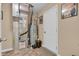 This utility room features neutral walls, tile floors and a water heater, with decor and storage solutions available at 10731 Jimmy Lake Dr, Indianapolis, IN 46239