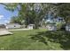 A spacious backyard with multiple outbuildings and a pergola at 1082 Galaxie Dr, Greenwood, IN 46142