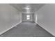 Carpeted basement features neutral paint, multiple access points, and recessed ceiling lighting at 1082 Galaxie Dr, Greenwood, IN 46142
