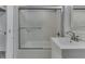 Bathroom featuring tiled shower and modern sink at 1082 Galaxie Dr, Greenwood, IN 46142