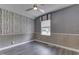 Bedroom featuring modern gray walls and birch print wallpaper at 1082 Galaxie Dr, Greenwood, IN 46142