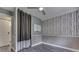 Bedroom featuring modern gray walls and a built-in closet at 1082 Galaxie Dr, Greenwood, IN 46142