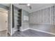 Bedroom featuring modern gray walls and a built-in closet at 1082 Galaxie Dr, Greenwood, IN 46142