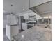 Modern kitchen featuring stainless steel appliances, granite countertops, and white cabinetry at 1082 Galaxie Dr, Greenwood, IN 46142