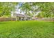 Large backyard offering ample space for outdoor activities with a well-kept lawn and privacy fence at 1104 Briarwood Dr, Brownsburg, IN 46112