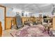 This is a finished basement with workout equipment and wood paneled walls at 1104 Briarwood Dr, Brownsburg, IN 46112