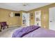 Bright bedroom features an ensuite bathroom and large window for natural light at 1104 Briarwood Dr, Brownsburg, IN 46112