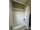 Close up of tub shower combo with white tile and shower head at 1128 S Pennsylvania St, Indianapolis, IN 46225