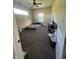 Bedroom with carpet flooring, natural light from two windows, and standard closet at 1128 S Pennsylvania St, Indianapolis, IN 46225