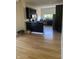Modern kitchen with sleek black cabinets, stainless steel appliances, and lots of storage space at 1128 S Pennsylvania St, Indianapolis, IN 46225