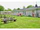 Large backyard with a fire pit and deck space for relaxing and entertaining at 12144 Trolley Rd, Indianapolis, IN 46236