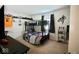 Neutrally decorated bedroom with a bunk bed and carpeted floors at 12144 Trolley Rd, Indianapolis, IN 46236