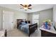 Bedroom with carpet, ceiling fan and an abundance of natural light at 13145 Roma Bnd, Carmel, IN 46074
