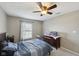 Bedroom with carpet, ceiling fan and an abundance of natural light at 13145 Roma Bnd, Carmel, IN 46074