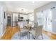 Eat-in kitchen featuring stainless appliances, granite countertops, updated cabinetry, and a dining area at 14135 Nicholas Dr, Carmel, IN 46074