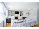 Bright living room featuring built-in shelving, fireplace, hardwood floors, and comfortable, modern furniture at 14135 Nicholas Dr, Carmel, IN 46074