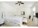 Bright main bedroom with vaulted ceiling, white furniture, neutral carpet, and modern decor at 14135 Nicholas Dr, Carmel, IN 46074