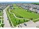 Aerial view of the community with extensive green space and walking paths winding through well-maintained lawns at 15116 Fenchurch Dr, Westfield, IN 46074