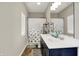 Bathroom featuring double sinks and a shower with decorative curtain at 15116 Fenchurch Dr, Westfield, IN 46074