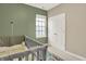 Bedroom featuring a large window and closet doors at 15116 Fenchurch Dr, Westfield, IN 46074