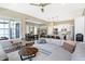 Sun-filled living room blending seamlessly with a modern kitchen and dining area at 15116 Fenchurch Dr, Westfield, IN 46074