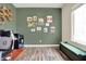 Office with stylish décor featuring a desk, gray chair, decor shelving, and wall art at 15116 Fenchurch Dr, Westfield, IN 46074