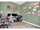 Office with stylish décor featuring a desk, gray chair, decor shelving, and wall art at 15116 Fenchurch Dr, Westfield, IN 46074