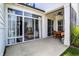 Spacious patio with sliding glass doors, a dining set, and inviting indoor-outdoor living space at 15116 Fenchurch Dr, Westfield, IN 46074
